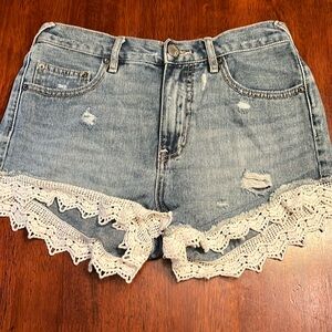 Free people distressed jean shorts with crochet hem size 26